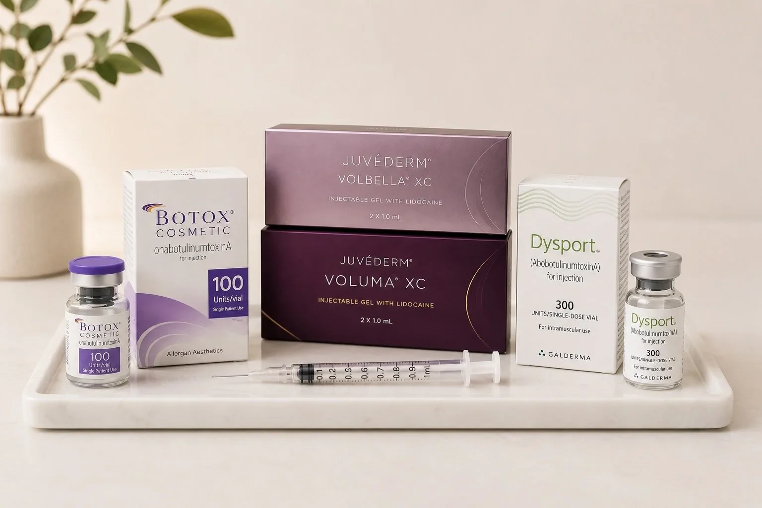 Premium FDA-cleared injectables on a marble tray &mdash; Majestic Aesthetics, Twin Falls